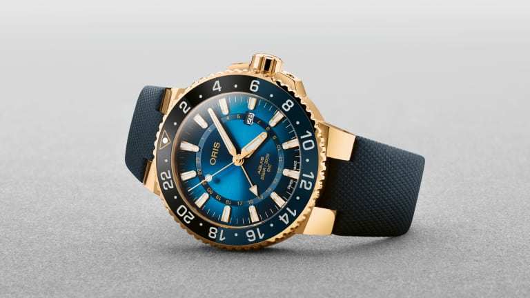 Oris' new limited edition Aquis is the brand's first solid gold timepiece