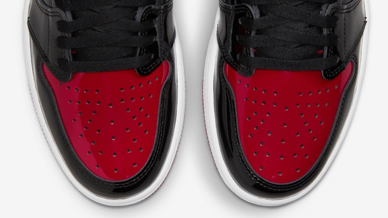 The Jordan "Bred" is back tomorrow in a patent leather finish