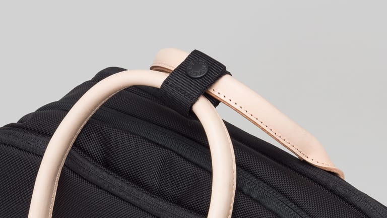 Hender Scheme upgrade the North Face's Shuttle Daypack with its signature leather