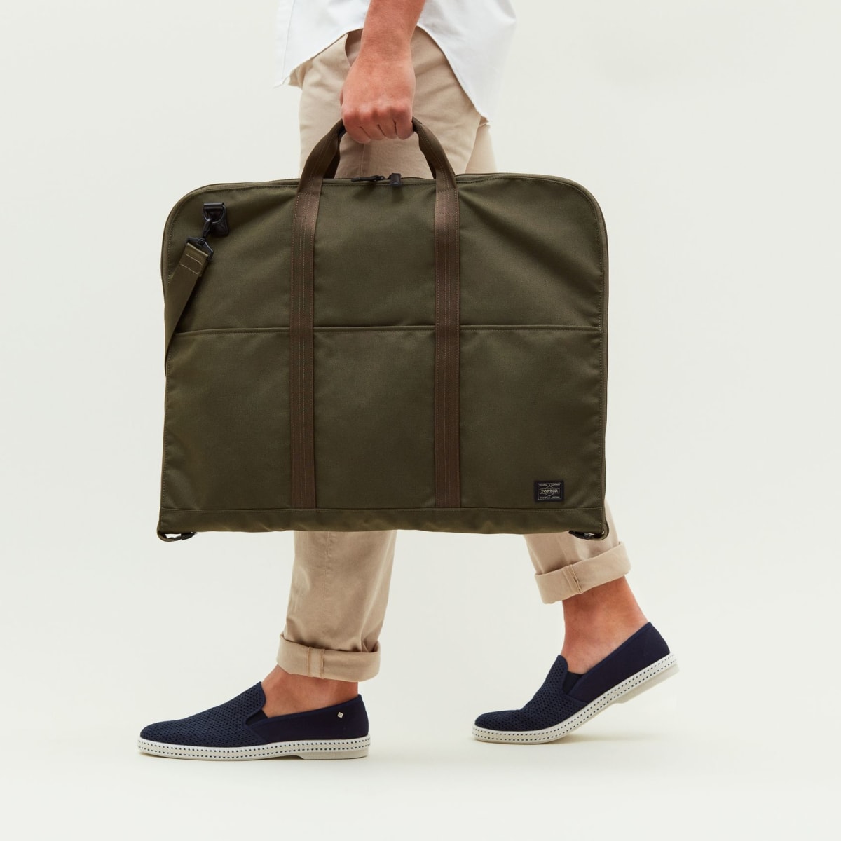 Porter s Suit Bag ensures that your tailored two piece travels as well as you do Acquire