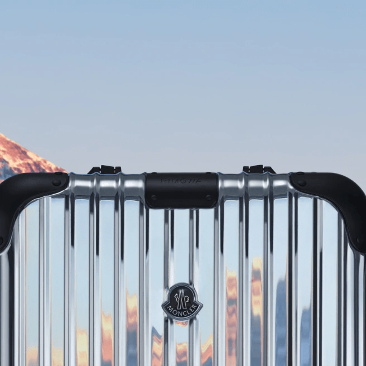 Moncler launches its latest collaboration with Rimowa - Acquire