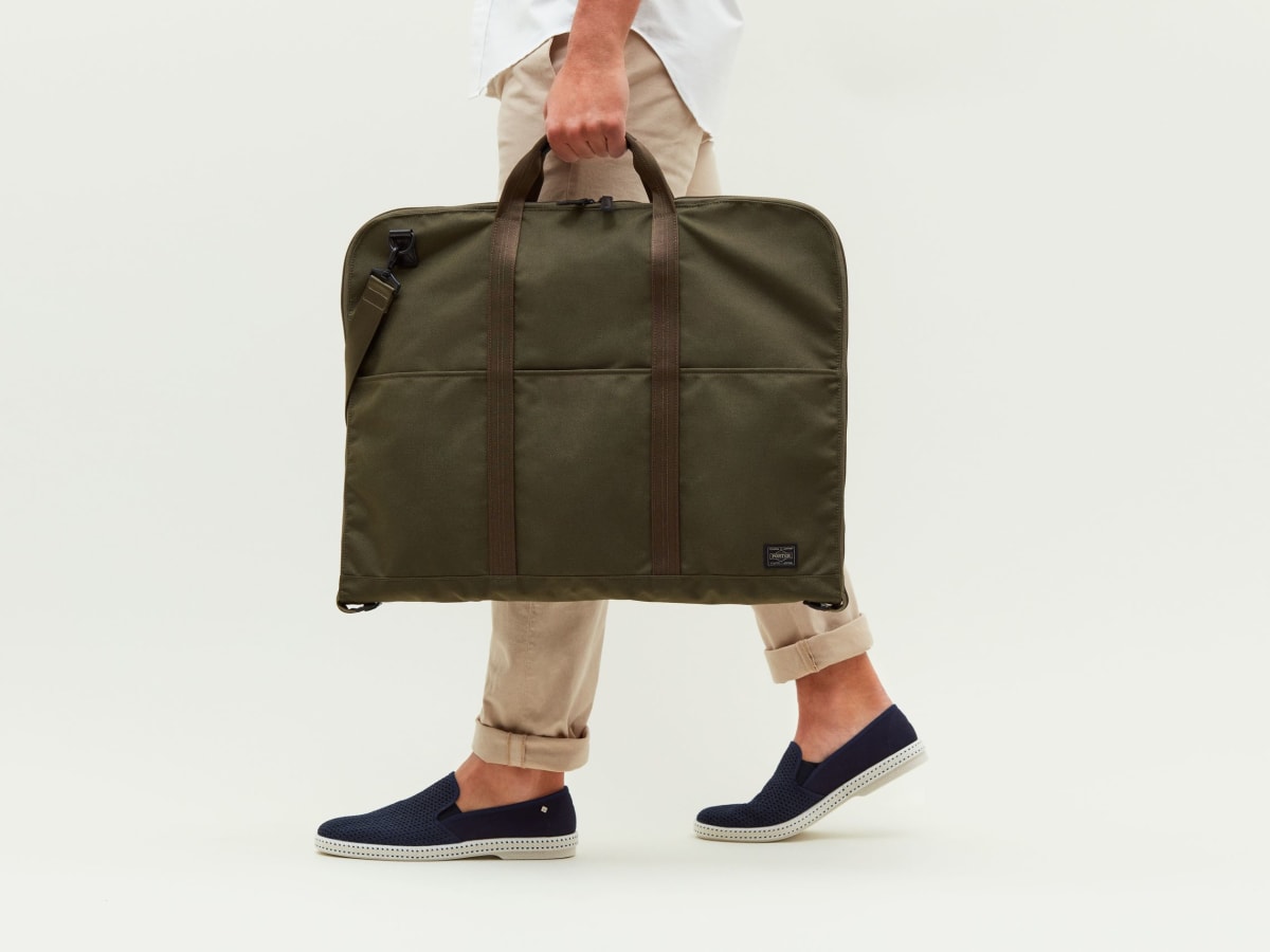 Porter's Suit Bag ensures that your tailored two-piece travels as well as  you do - Acquire