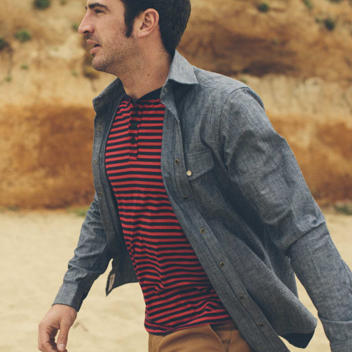 Photo: Taylor Stitch (Model is wearing the Chambray Glacier Shirt, Stripe Camp Henley, and the Canvas Camp Shorts)