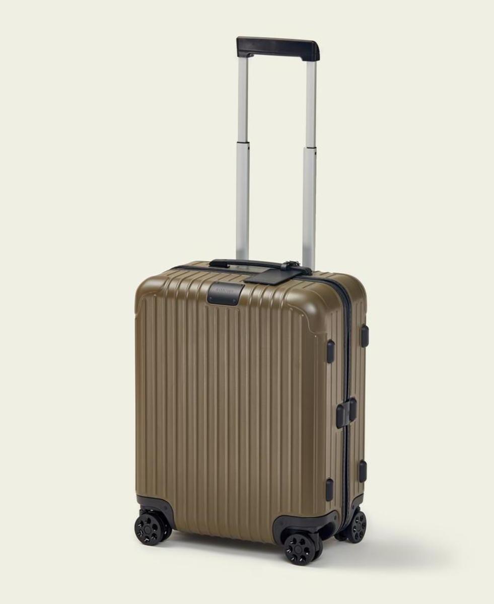 Monocle re-releases its army green Rimowa suitcases - Acquire